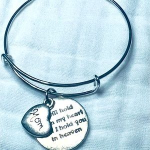 Silver bracelets with charms